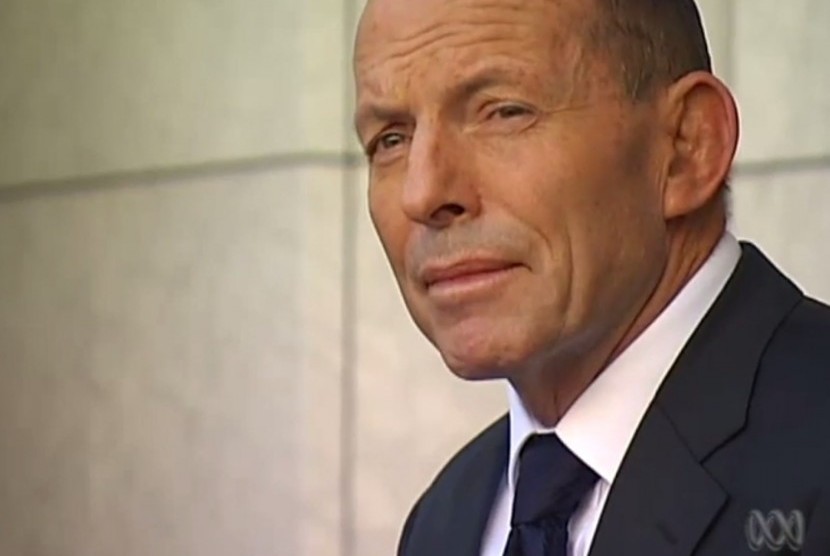 Tony Abbott tampak murung saat memberikan keterangan pers terakhir sebagai perdana menteri Australia, Selasa (15/9).