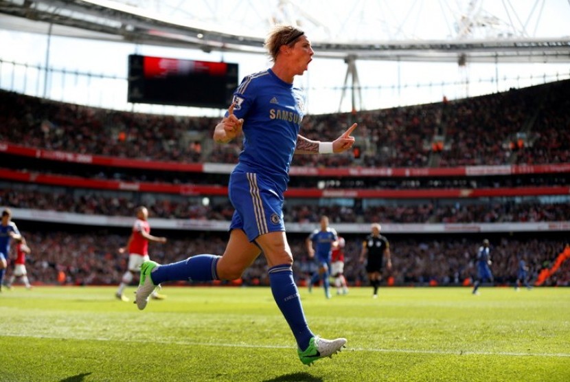 Torrres merayakan gol ke gawang Arsenal dalam lanjutan Liga Inggris di Emirates Stadium, Sabtu (29/9)