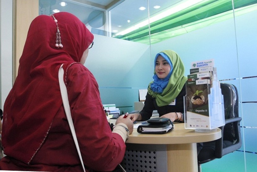 Transaction in an islamic banking in Bekasi, West Java. (illustration)  