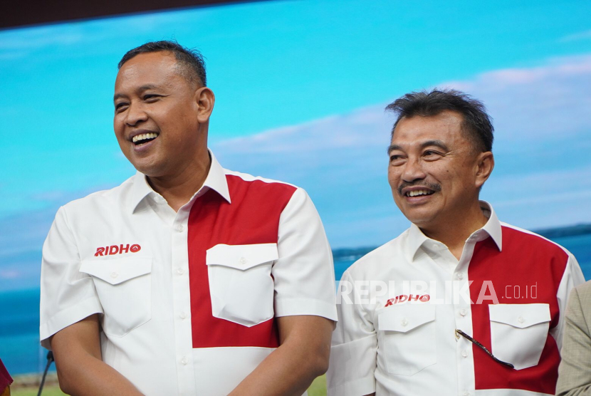 Tri Adhianto dan Haris Bobihoe.