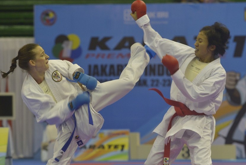 Two karate athletes spar ini a match. (illustration) 