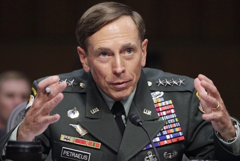 U.S. General David Petraeus gestures during the Senate Intelligence Committee hearing on his nomination to be director of the Central Intelligence Agency on Capitol Hill in Washington in this June 23, 2011. (file photo)  