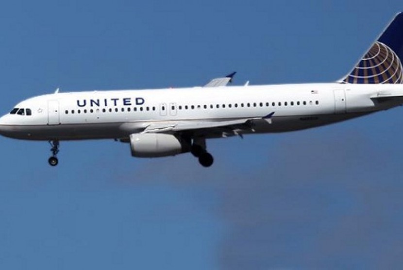 United Airlines flight makes an emergency landing at Dulles Washington International Airport and escorted by a military jet after a male passenger got up in the middle of the aisle and began to pray on Thursday.  