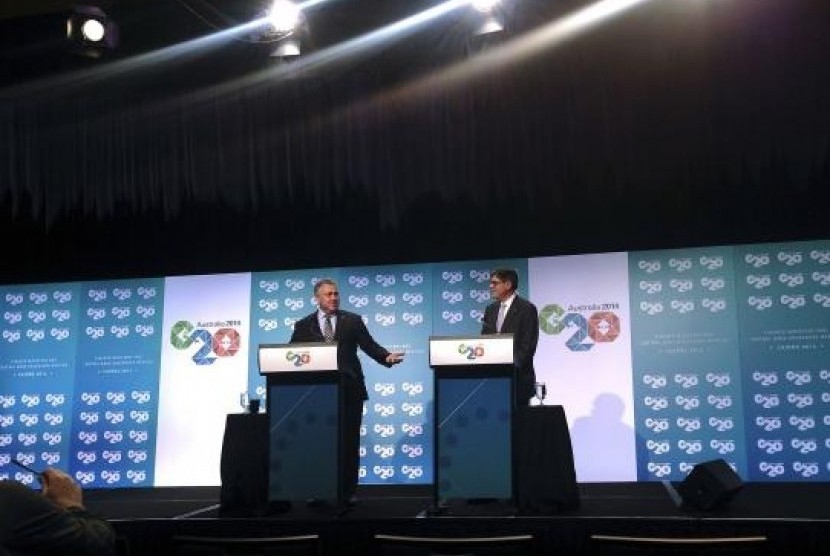 US Treasury Secretary Jack Lew (right) stands with his Australian counterpart Joe Hockey during a media conference at the start of the G20 Finance Ministers and Central Bank Governors meeting in Cairns, Sept 19, 2014