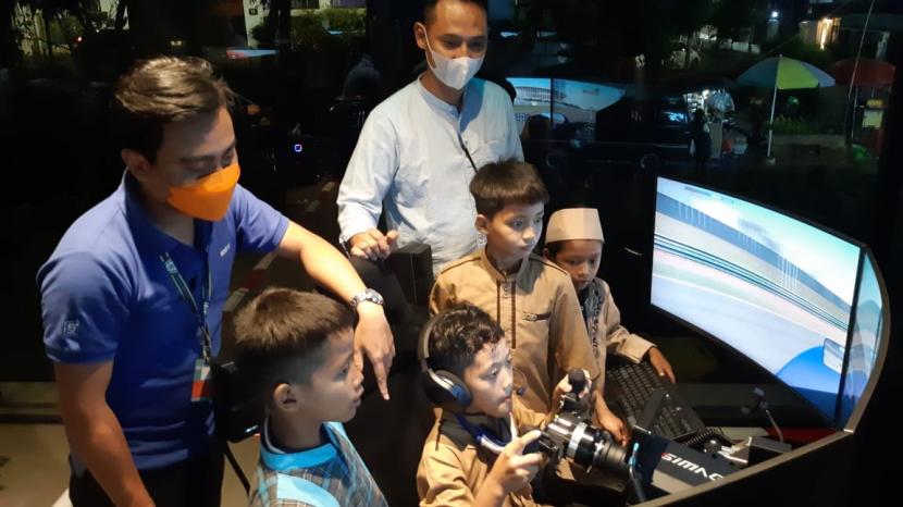 Usai Bukber di LPDUK, Anak-Anak Yatim Depok Ceria Jajal Fasiltas Digital Motorsport.