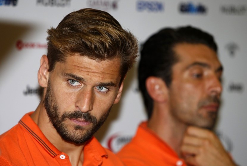 uventus' Llorente and goalkeeper Buffon attend a news conference ahead of their friendly soccer match against Singapore Selection at the Sports Hub in Singapore