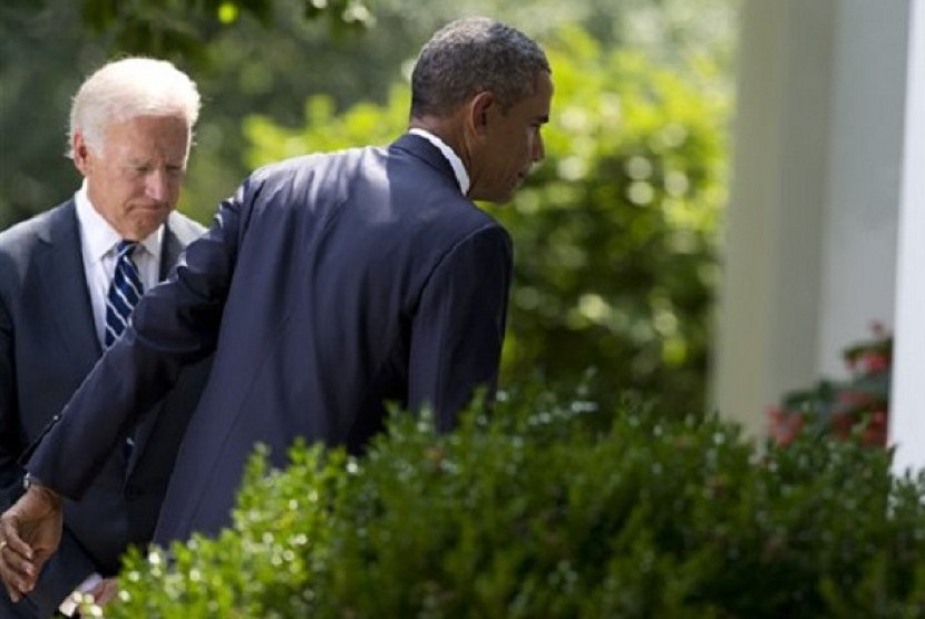 Vice President Joe Biden, left, follows President Barack Obama as he leaves the Rose Garden after making a statement about the crisis in Syria at the White House in Washington Saturday, Aug. 31, 2013 in Washington. 