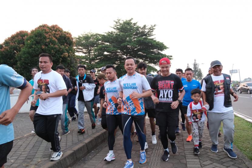 Wali Kota Bogor Bima Arya saat melakukan lari pagi bersama Bacapres PDIP Ganjar Pranowo. 