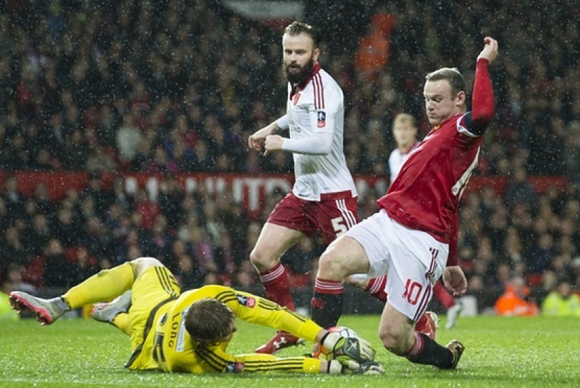 Wayne Rooney gagal menciptakan gol saat MU menghadapi Sheffield di lanjutan Piala FA, Ahad (10/1)