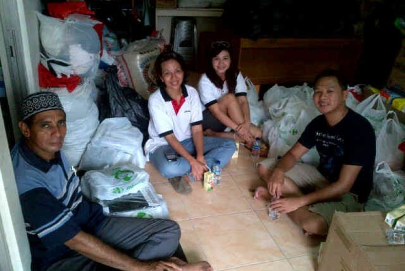 WCC membantu korban banjir Jakarta dengan 'white heart'.