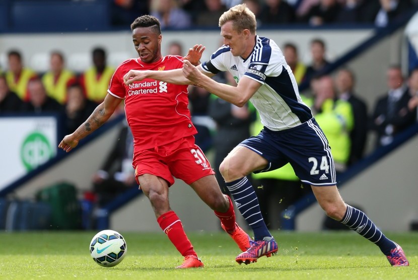 West Brom's Darren Fletcher in action with Liverpool's Raheem Sterling