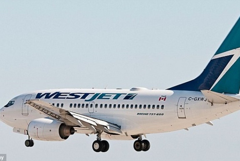 Maskapai penerbangan WestJet. Candaan seorang pria asal Kanada membuat pesawat WestJet putar balik ke Toronto.