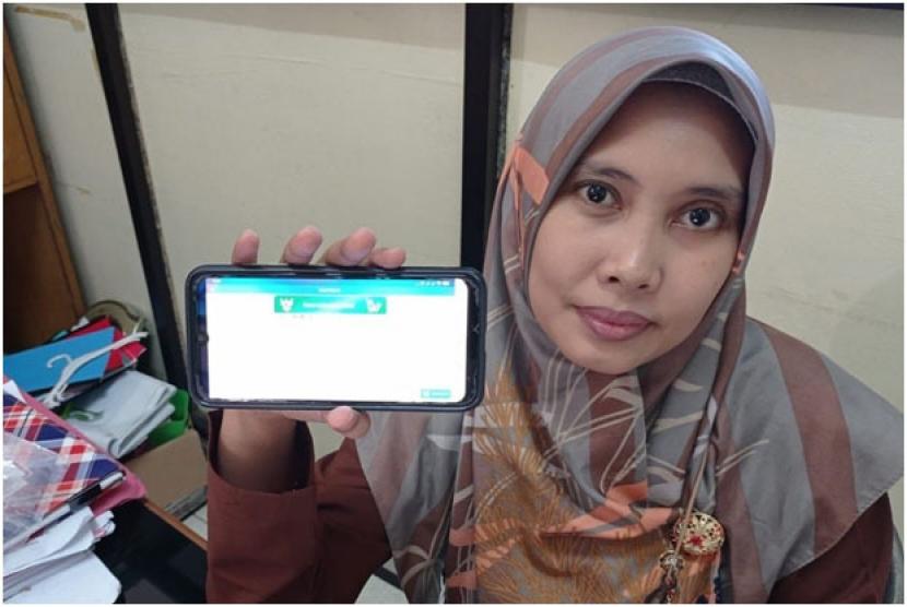  Winda Ramadianti, peserta JKN segmen Pekerja Penerima Upah (PPU) kelas 2 Kabupaten Bandung.