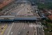 Sejumlah kendaraan melintas di Pintu masuk Tol Cikarang Utama, Jakarta, Jumat (8/6).