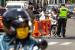 Petugas gabungan mengarahkan pengendara sepeda motor untuk menjalani pemeriksaan saat penerapan Pembatasan Sosial Berskala Besar (PSBB) di Jalan Laks. Laut RE Martadinata, Purwakarta, Jawa Barat, Senin (11/5/2020)