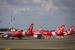 Sejumlah armada pesawat AirAsia terparkir di Apron Terminal 1D Bandara Soekarno Hatta, Tangerang, Banten, Selasa (5/5/2020). 