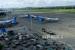 Sejumlah pesawat terbang terparkir di Bandara Sentani, Jayapura, Papua, Jumat (27/3/2020). PT Angkasa Pura I Bandara Sentani di Kabupaten Jayapura, Papua pada H+1 Lebaran melayani 32 penerbangan saja atau turun 38 persen.