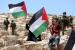  Warga Palestina mengibarkan bendera