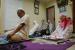 Ahmad Fauzi (kanan) bersama keluarganya melaksanakan shalat tarawih di rumahnya di kawasan Jati Padang, Pasar Minggu, Jakarta Selatan, Senin (27/4). Pemerintah mengimbau umat muslim untuk melaksanakan shalat tarawih selama bulan suci Ramadan dilakukan  di rumah  masing-masing saat pandemi COVID-19 guna mencegah penyebaran COVID-19