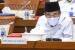 Menteri Agama Fachrul Razi mengikuti rapat kerja dengan Komisi VIII DPR  di kompleks Parlemen, Senayan, Jakarta, Senin (23/11/2020). Rapat kerja tersebut membahas laporan keuangan haji tahun 1441 H/2020 M dan persiapan penyambutan ibadah haji tahun 1442 H/2021 M. 