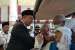 Amirul Hajj Indonesia Menag Lukman Hakim Saifuddin saat menyapa para jamaah haji.