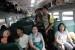  Aparat kepolisian berjalan menjaga keamanan di gerbong kereta Lebaran. (Ilustrasi)