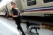 Aparat kepolisian menggunakan anjing pelacak di peron stasiun (ilustrasi).
