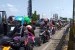Arus kendaraan di Simpang Jomin (Karawang) dari arah Jakarta - Bekasi - Karawang menuju Cirebon melalui jalur Pantura non tol padat merayap pada Kamis (30/5) jam 14.00 WIB.