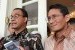 Gubernur DKI Jakarta Anies Baswedan (kiri) dan Wakilnya, Sandiaga Uno (kanan)