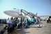 Jamaah calon haji kelompok terbang (kloter) pertama Embarkasi Surabaya berjalan menuju pesawat di Bandara Udara Internasional Juanda, Sidoarjo, Jawa Timur, Selasa (17/7). 