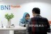  Karyawati melayani nasabah di Banking Hall Bank BNI Syariah (Ilustrasi)