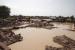 Kerusakan terlihat setelah hujan deras di desa Aboud di distrik El-Manaqil di Provinsi Al-Jazirah, Sudan pada 22 Agustus 2022. PBB memperkirakan lebih dari 100.000 orang telah terkena dampak banjir di Sudan timur dan Kordofan. negara bagian. Musim hujan di Sudan biasanya berlangsung hingga September, dengan puncak banjir sebelum itu. 