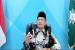 Ketua Umum PP Muhammadiyah Haedar Nashir. Ketum Muhammadiyah Imbau Pemudik tidak Euforia Berlebihan