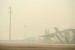  Landasan pacu tidak beroperasi karena diselimuti kabut asap di Bandara Sultan Syarif Kasim II, di Pekanbaru, Riau, Senin (14/9).  (Antar/Rony Muharman)