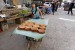   Seorang anak menjual roti manis di hari pertama bulan suci Ramadhan di lingkungan kota Aleppo, Suriah, Ahad (29/6). (Reuters/Hosam Katan)