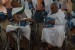 Muchroji (56 tahun, kanan), jamaah haji Kloter 71 Embarkasi Solo, shalat mahgrib di kursi rodanya di ruang transit penumpang setelah mendarat di Bandara Internasional King Abdul Aziz (KAIA), Jeddah, Arab Saudi, Ahad (28/9).(Republika/Zaky Alhamzah)