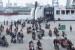  Pemudik arus balik keluar dari KMP Sebuku dengan mengendarai sepeda motor di Pelabuhan Tanjung Priok, Jakarta, Ahad (2/7).