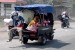  Pemudik yang menggunakan motor roda tiga melintas di Jalur Pantura, Brebes, Jawa Tengah, Sabtu (3/8). (Republika/Yasin Habibi)