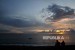 Pengunjung menikmati matahari terbenam di Pantai Sengigi, Lombok Barat, Nusa Tenggara Barat (NTB). 