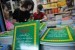  Pengunjung toko tengah memilih kitab suci Al Quran dan buku agama yang akan dibeli di los buku, Pasar Senen, Jakarta Pusat, Senin (16/7).  (Aditya Pradana Putra/Republika)