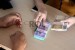 Warga melakukan penukaran uang kertas pecahan kecil
