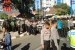 Petugas melakukan pengamanan 'Open House' Jusuf Kalla di Makassar