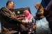 Petugas memeriksa kelengkapan identitas pemudik setibanya di Terminal Cicaheum, Bandung, Jabar