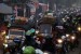 Ribuan pengendara sepeda motor memenuhi ruas jalan alternatif menuju Cirebon di Cilamaya, Kabupaten Karawang, Jawa Barat, Jumat (17/8). (Aditya Pradana Putra/Republika)
