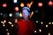 Seorang anak kecil memegang lampu botol saat perayaan tradisi Tumbilotohe (malam pasang lampu) di Limboto, Kabupaten Gorontalo.