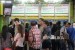 Suasana penumpang di stasiun Gambir, Jakarta, Kamis (14/1).