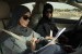 Suhailah, sopir taksi perempuan pertama Saudi tengah bekerja melayani penumpang.