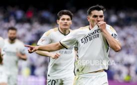 Pemain Real Madrid Brahim Diaz merayakan gol ke gawang Cadiz. Madrid dipastikan juara La Liga Spanyol setelah Barcelona kalah dari Girona.