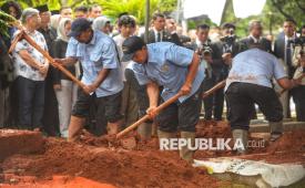 Ilustrasi menguburkan jenazah.