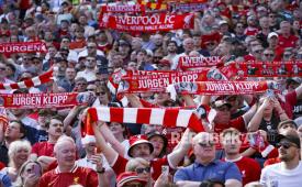  Liverpool supporters celebrate departing manager Juergen Klopp during the English Premier League soccer match of Liverpool FC against Wolverhampton Wanderers, in Liverpool, Britain, 19 May 2024.   